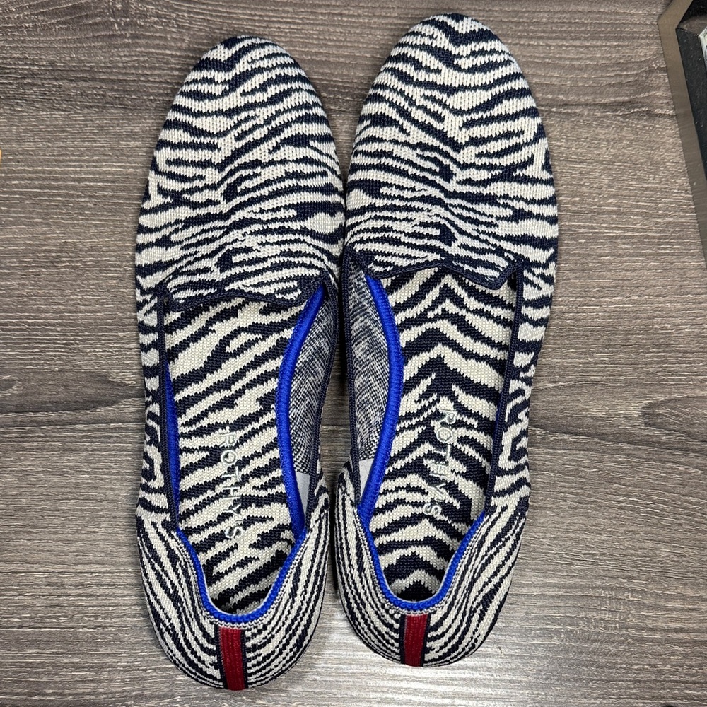 Rothy’s Zebra Patterned Slip-On Shoes